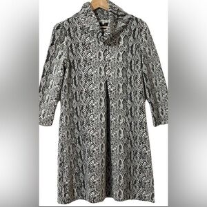 Tyler Boe  dress snake or lizard print 64% Polyester 34% Rayon 2% Spandex